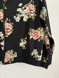 Bomber negra con flores